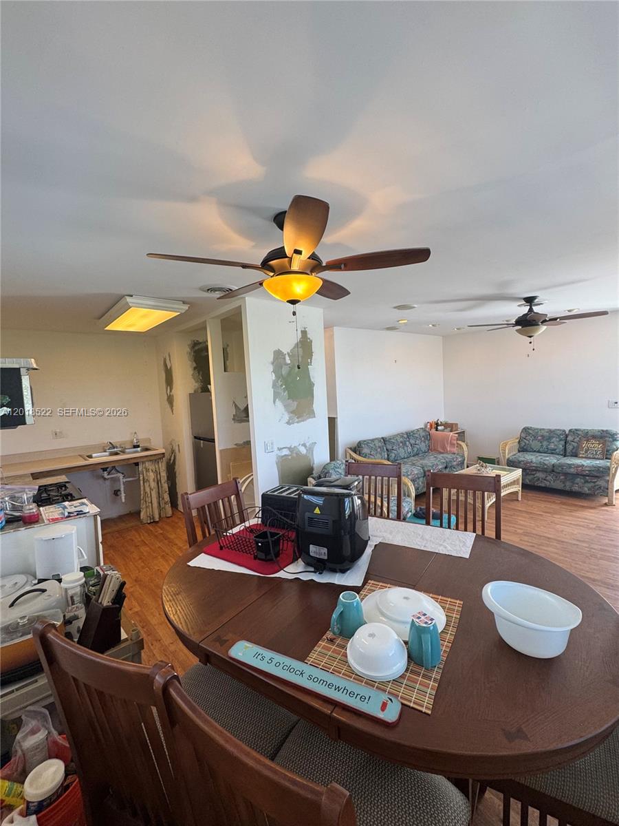 4276 Dorn Road Summerland Key, FL 33042 - Photo 7 of 23 a living room with furniture and wooden floor
