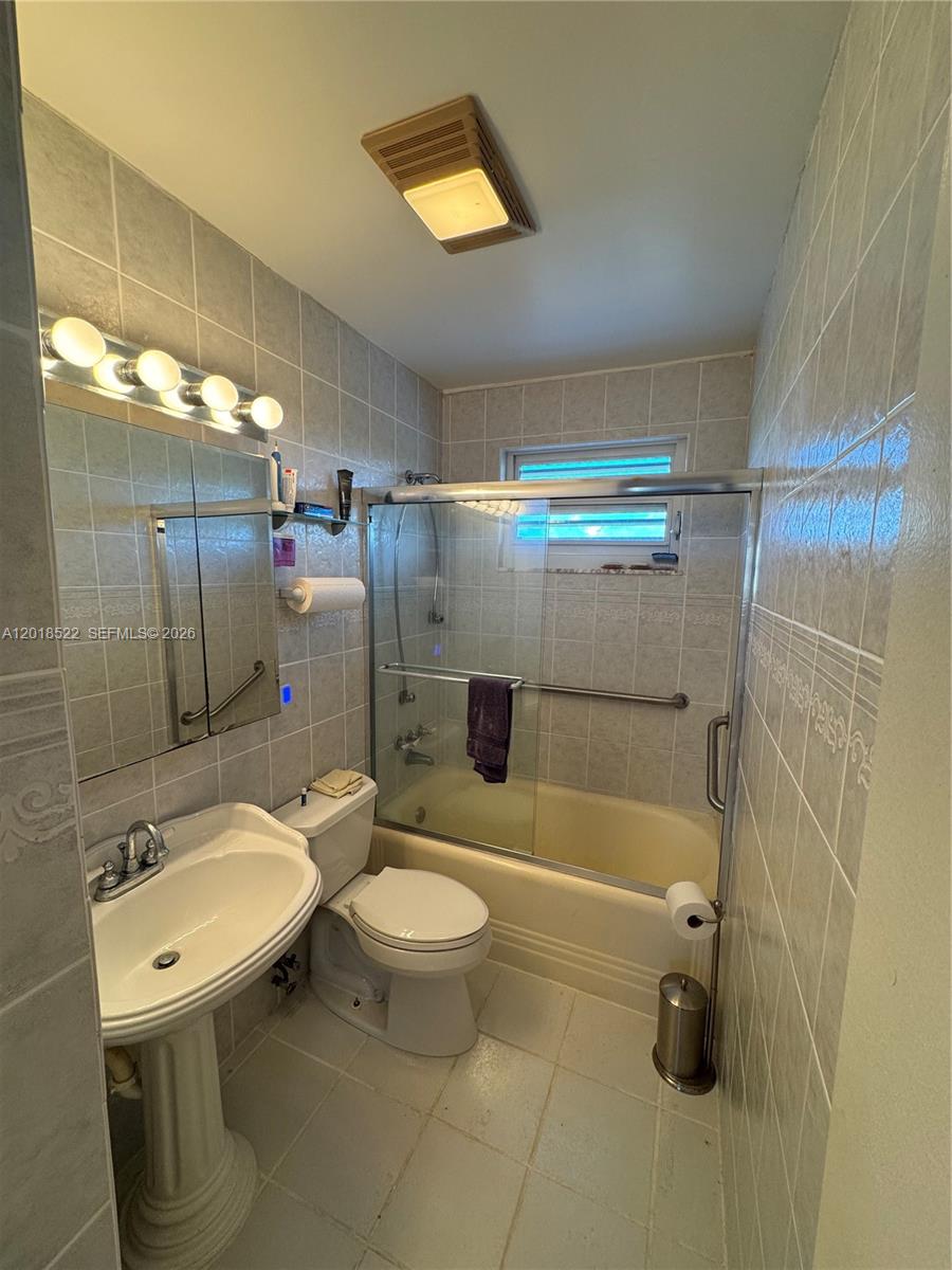 4276 Dorn Road Summerland Key, FL 33042 - Photo 9 of 23 a bathroom with a sink toilet and shower