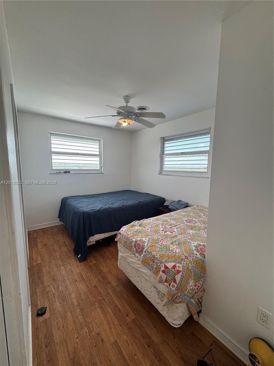 4276 Dorn Road Summerland Key, FL 33042 - Photo 10 of 23 a bedroom with two beds and a window