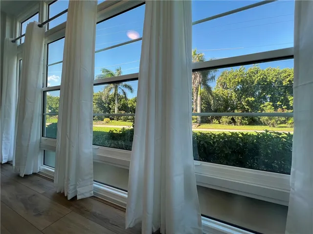 a view of a balcony from a window