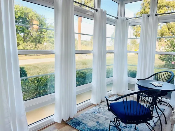 a view of a room with furniture window and outside view