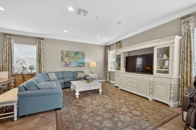 a bedroom with a bed and a mirror