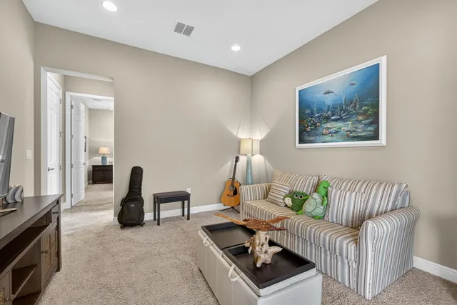 a bedroom with a bed and a cabinets