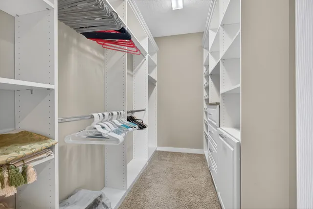 an aerial view of a house with swimming pool