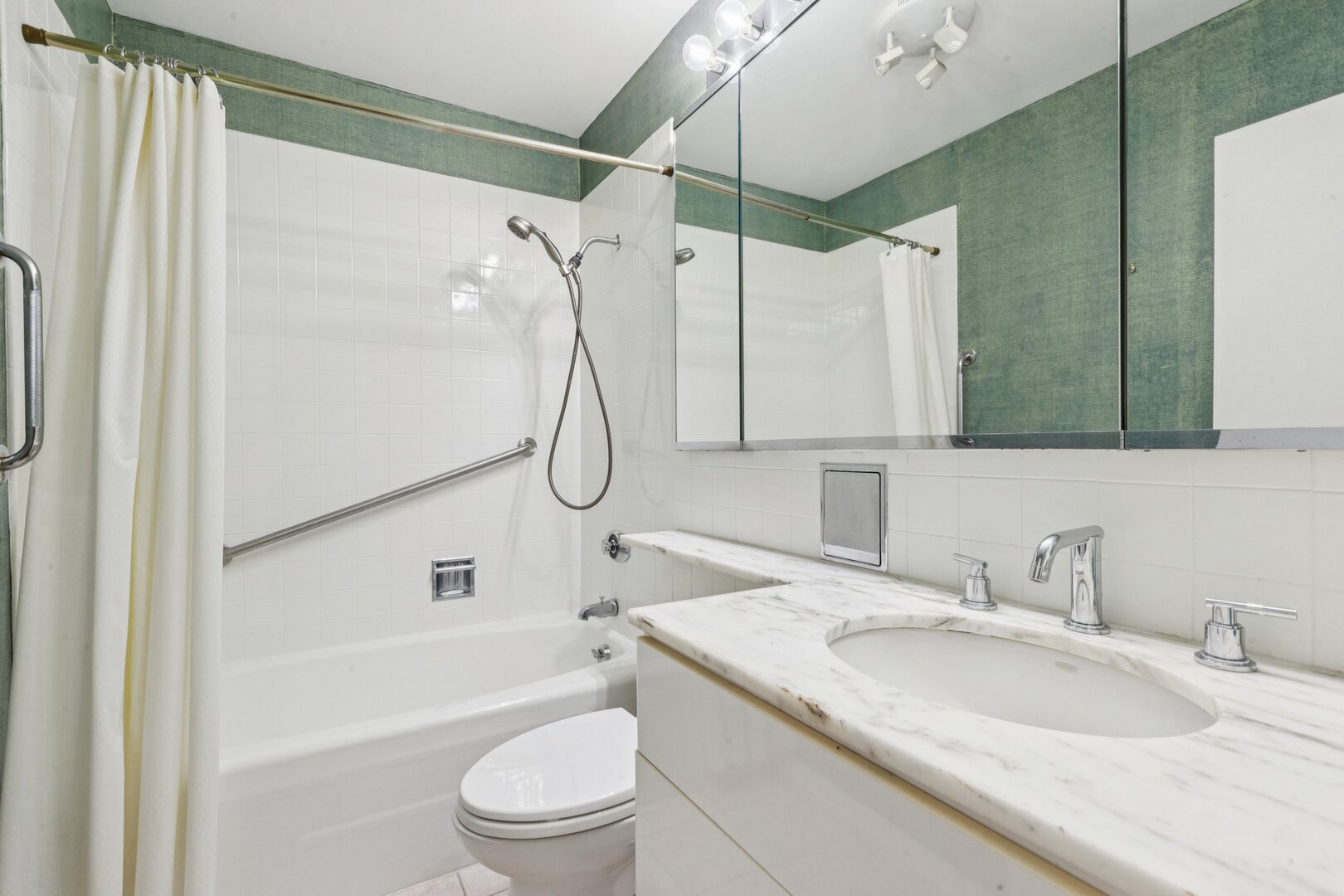1212 North Lake Shore Drive, Unit 10CS Chicago, IL 60610 - Photo 24 of 65 a bathroom with a granite countertop sink a toilet and shower