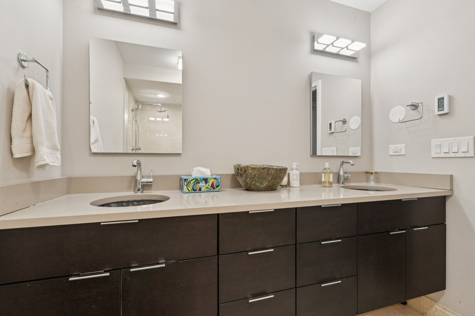 1212 North Lake Shore Drive, Unit 10CS Chicago, IL 60610 - Photo 33 of 65 a bathroom with a double vanity sink and a mirror