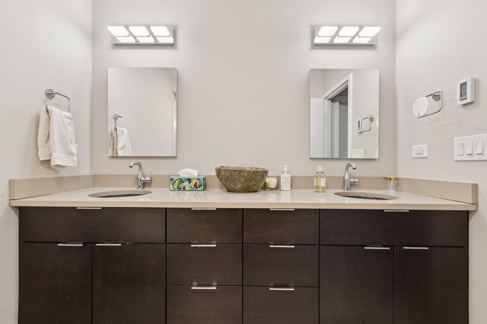 1212 North Lake Shore Drive, Unit 10CS Chicago, IL 60610 - Photo 34 of 65 a bathroom with double sink and a mirror
