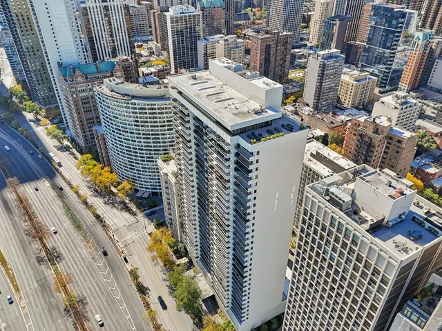 a view of swimming pool with outdoor seating