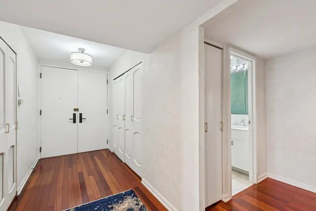 a view of a hallway view with staircase