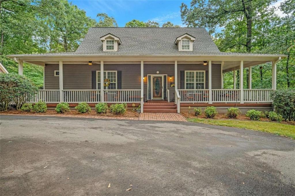 464 Covered Bridge Road Covington, GA 30016 - Photo 1 of 1 front view of a house with a porch