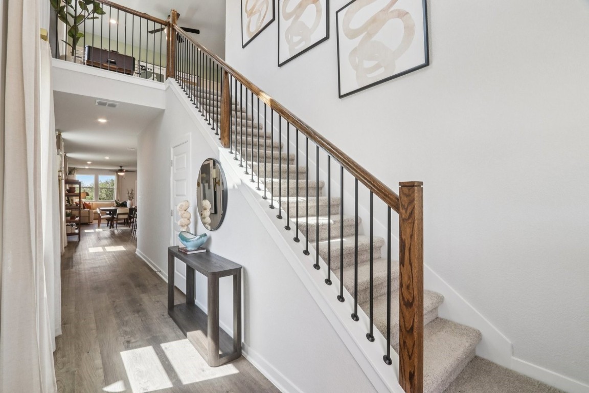 1213 Lavender Way Georgetown, TX 78628 - Photo 17 of 25 a view of entryway and hall with wooden floor