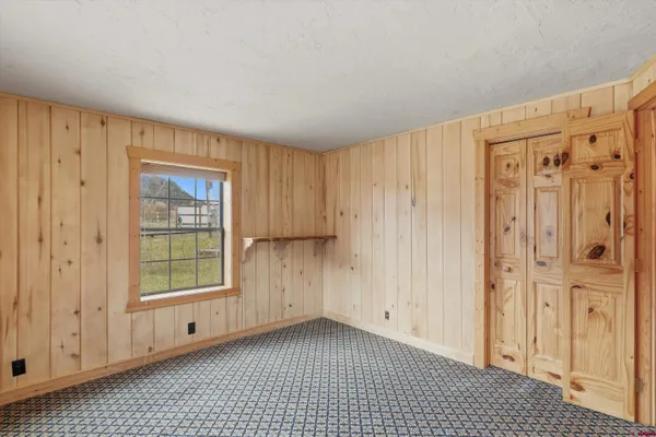 a view of wooden floor in a living room