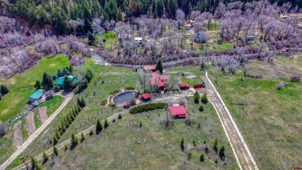 a view of a houses with a yard