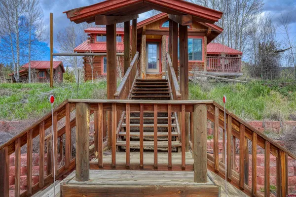 a balcony view with a seating space