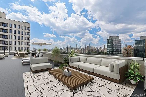 26-15 4th Street, Unit 3D Queens, NY 11102 - Photo 7 of 9 View of patio / terrace with a skyline view and outdoor lounge area