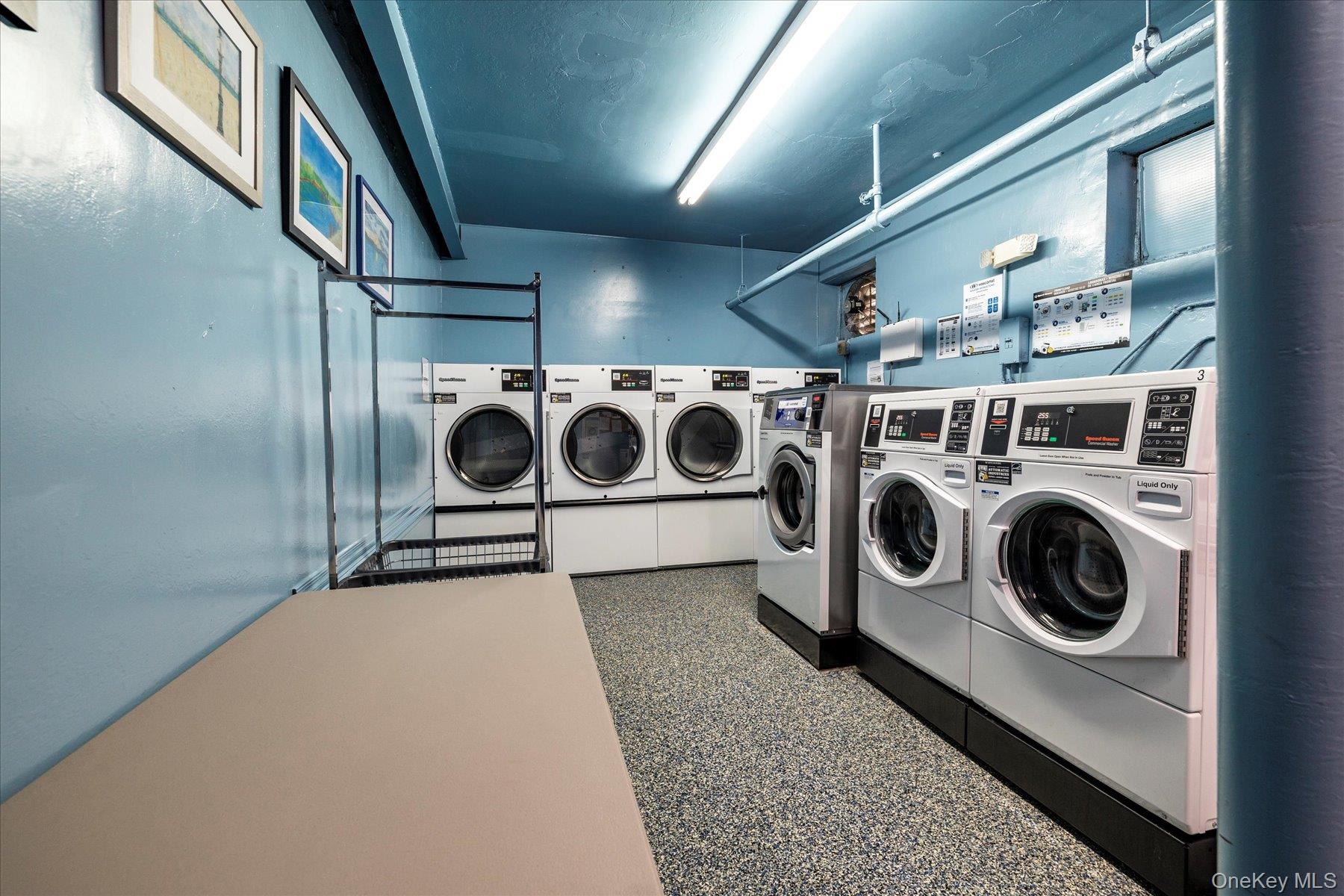 194 Smith Street, Unit 1K Freeport, NY 11520 - Photo 17 of 18 a utility room with dryer and washer