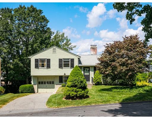 22 Eaton Road Lexington, MA 02420 - Photo 1 of 17 a front view of a house with a yard