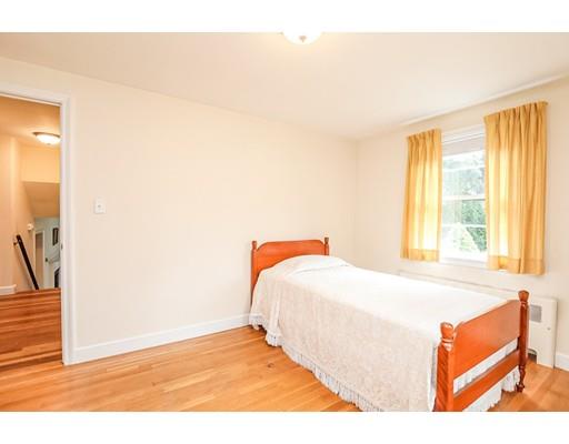 22 Eaton Road Lexington, MA 02420 - Photo 11 of 17 a bedroom with a bed and a window