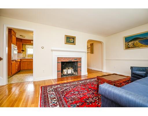 22 Eaton Road Lexington, MA 02420 - Photo 2 of 17 a living room with furniture and a fireplace