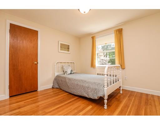 22 Eaton Road Lexington, MA 02420 - Photo 9 of 17 a bedroom with a bed and wooden floor