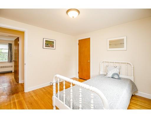 22 Eaton Road Lexington, MA 02420 - Photo 10 of 17 a bedroom with a bed and wooden floor