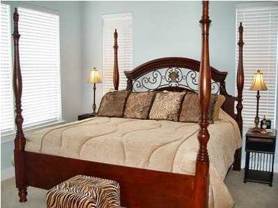 25 Pompano Street Inlet Beach, FL 32461 - Photo 4 of 10 a bedroom with a bed and window