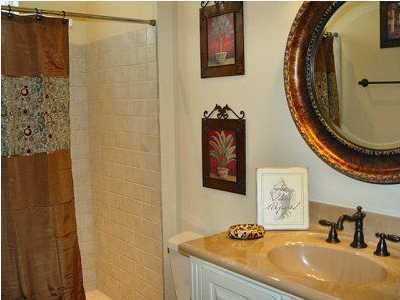 25 Pompano Street Inlet Beach, FL 32461 - Photo 6 of 10 a bathroom with a sink and a mirror