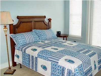 25 Pompano Street Inlet Beach, FL 32461 - Photo 7 of 10 a bedroom with a bed and a dresser