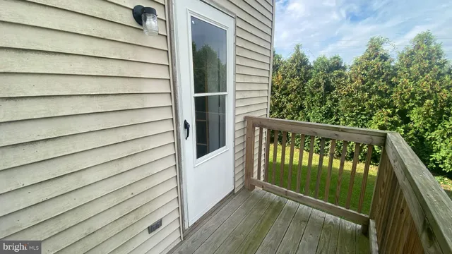 a view of a balcony with stairs