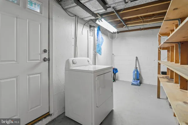 a bathroom with a tub and sink