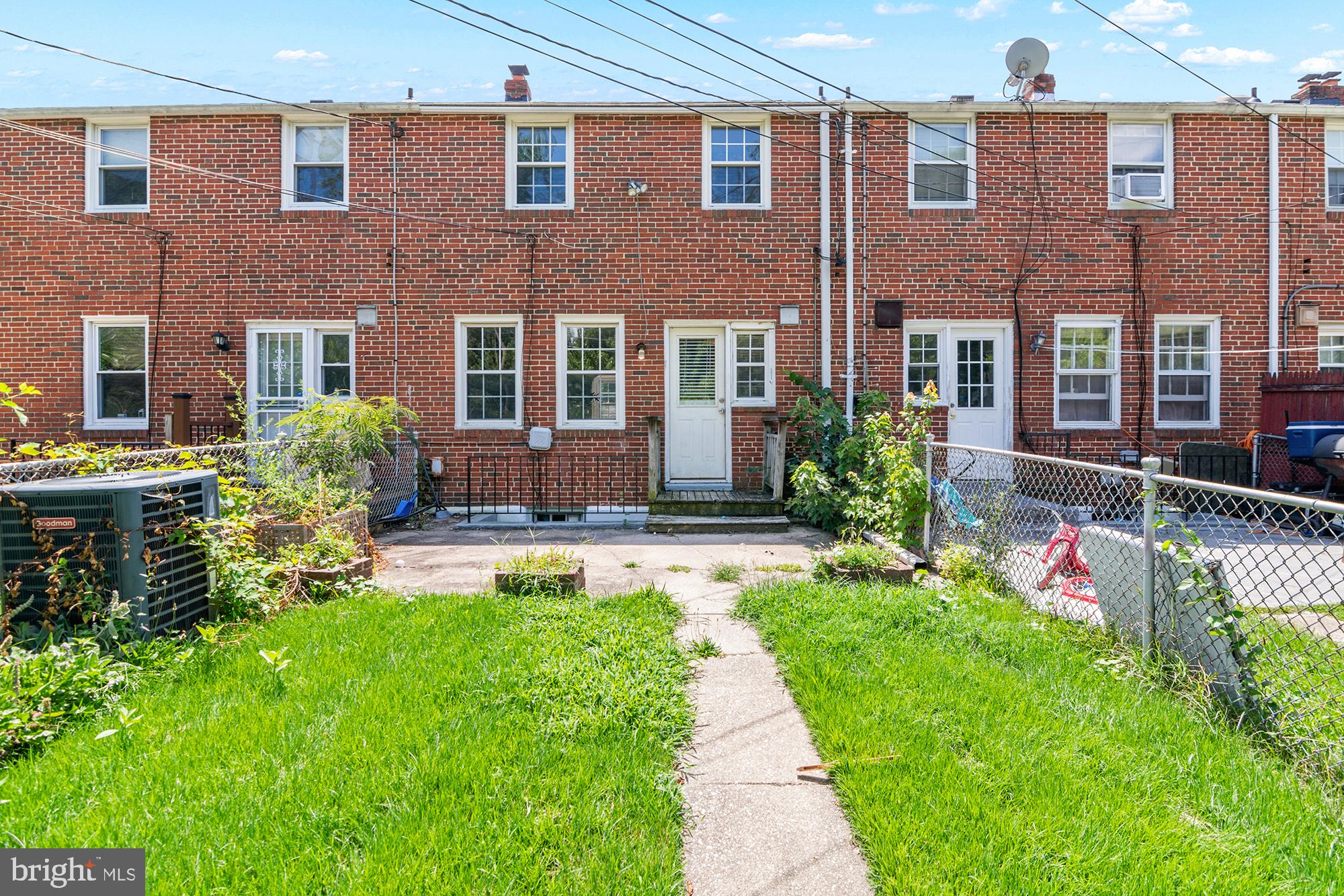 1644 Thetford Road Towson, MD 21286 - Photo 38 of 40 a front view of a house with a yard