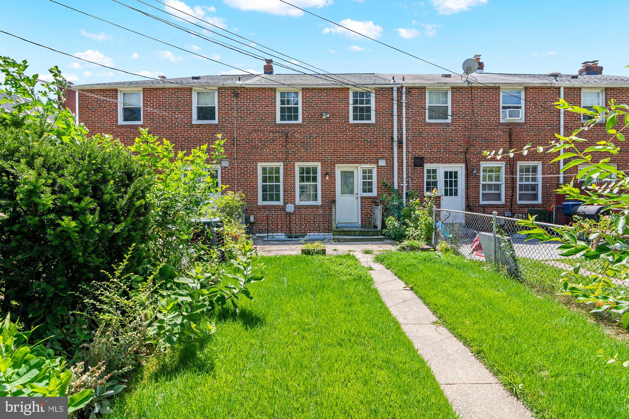 1644 Thetford Road Towson, MD 21286 - Photo 39 of 40 a front view of a house with garden