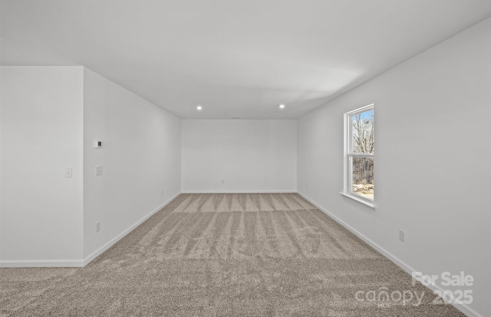 11416 Glasden Road, Unit 511 Charlotte, NC 28278 - Photo 13 of 13 an empty room with a bench