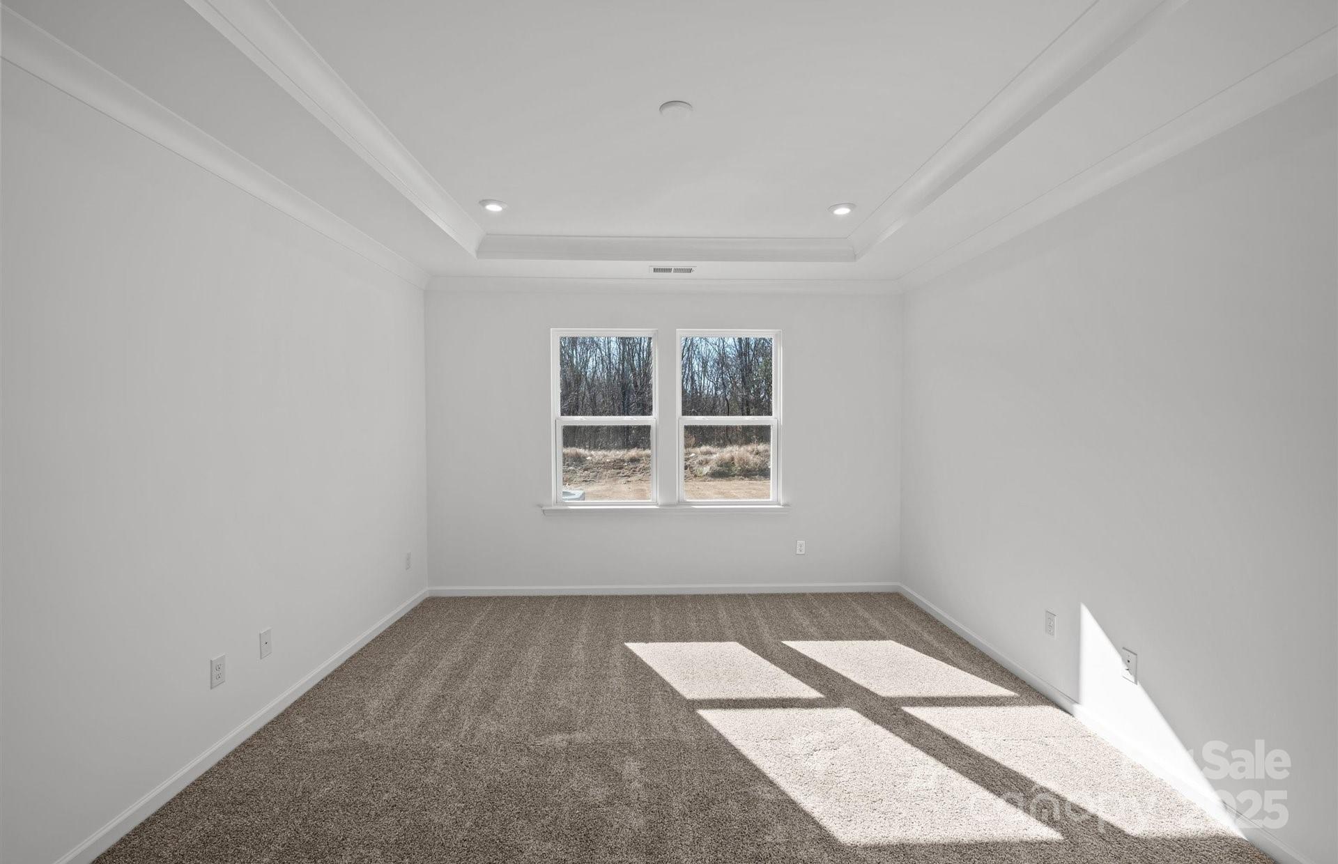11416 Glasden Road, Unit 511 Charlotte, NC 28278 - Photo 6 of 13 an empty room with a window