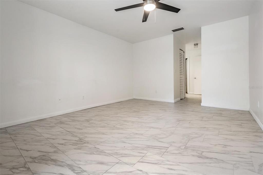 2292 Oak Neck Road, Unit A Clearwater, FL 33763 - Photo 20 of 37 wooden floor in an empty room