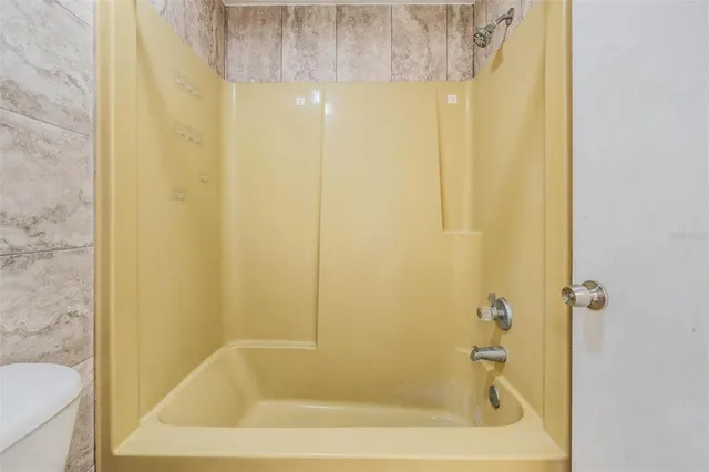 a bathroom with a bathtub
