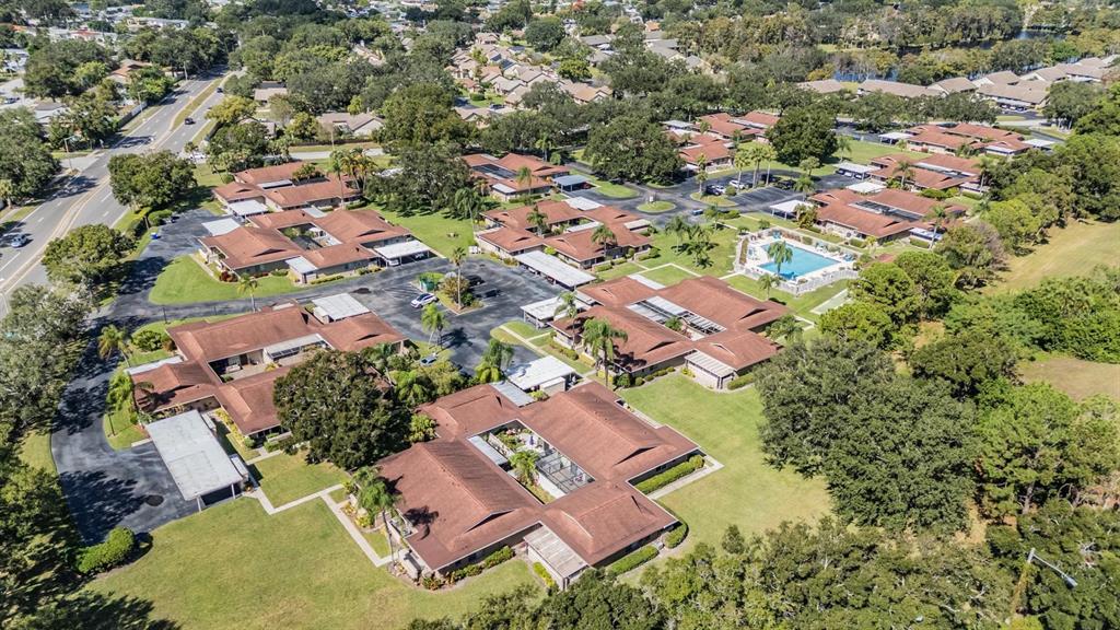 2292 Oak Neck Road, Unit A Clearwater, FL 33763 - Photo 34 of 37 an aerial view of residential house with outdoor space and swimming pool