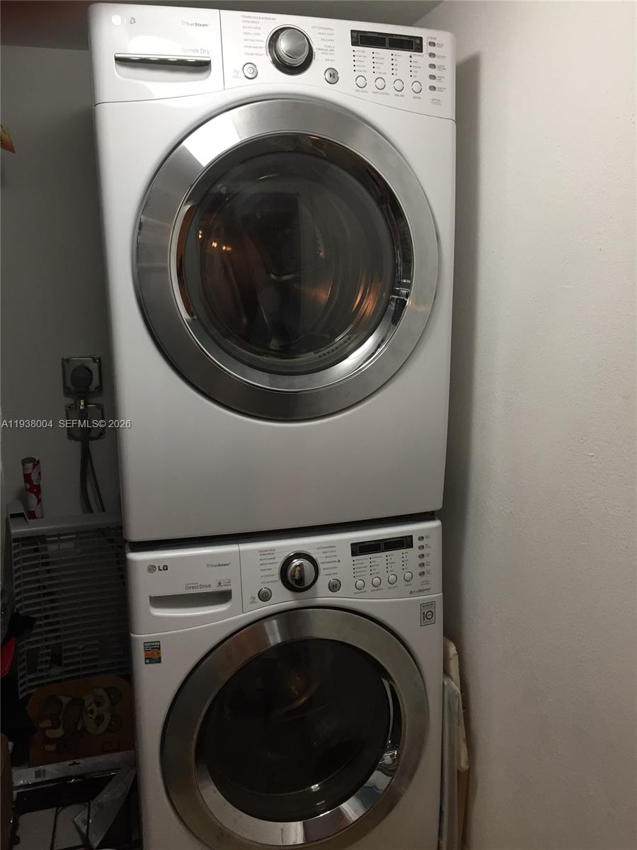 13253 Southwest 111th Terrace, Unit 3 Miami, FL 33186 - Photo 19 of 48 a utility room with dryer and washer