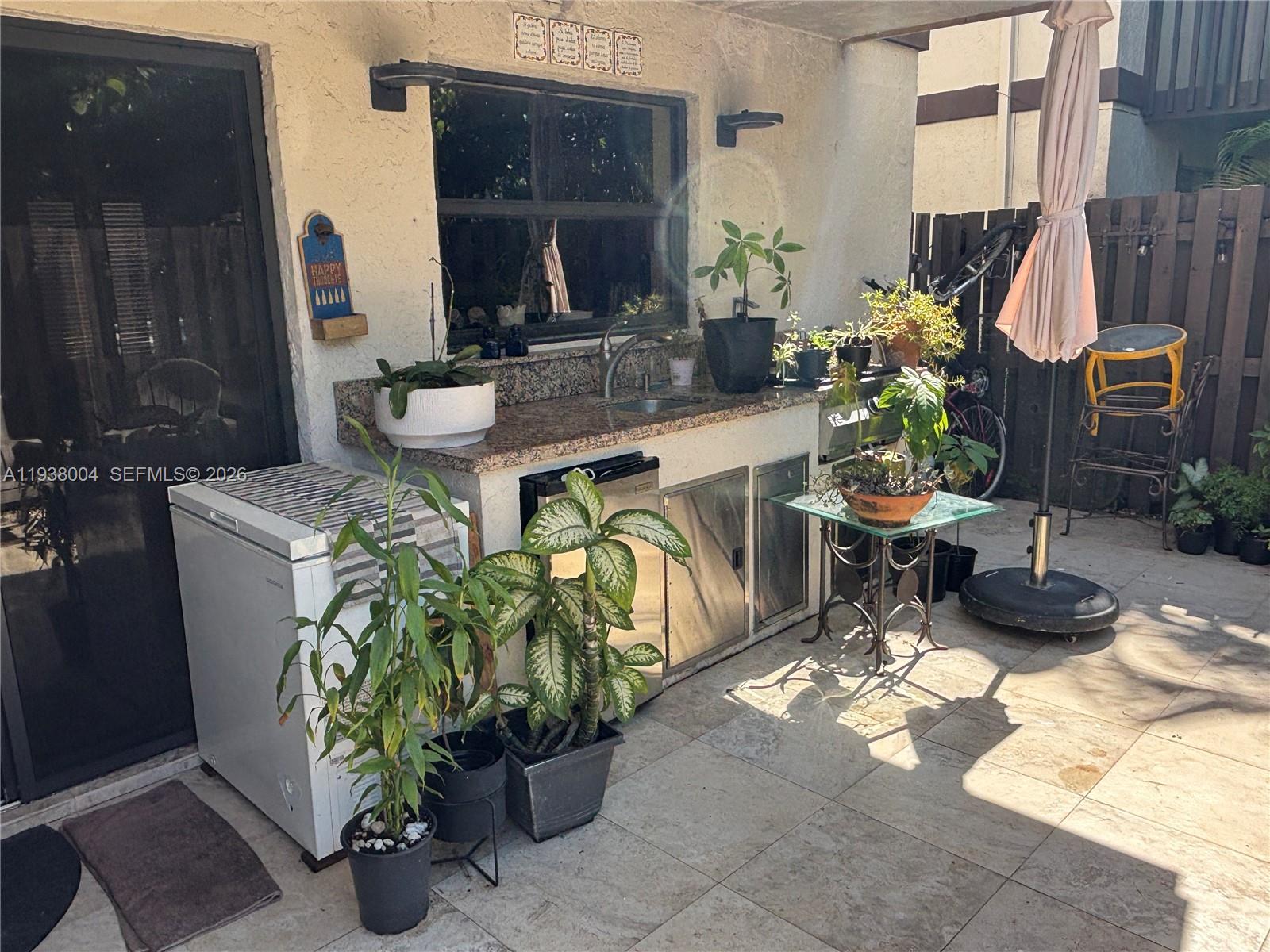 13253 Southwest 111th Terrace, Unit 3 Miami, FL 33186 - Photo 41 of 48 a dining room with furniture