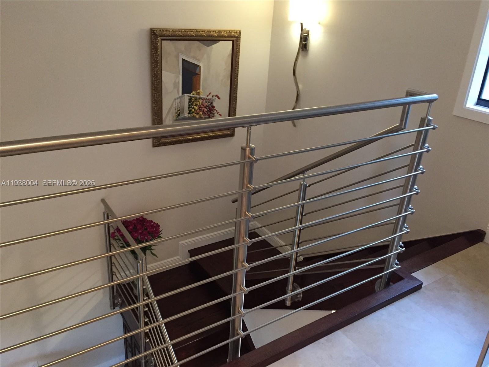 13253 Southwest 111th Terrace, Unit 3 Miami, FL 33186 - Photo 7 of 48 a view of room with wooden floor