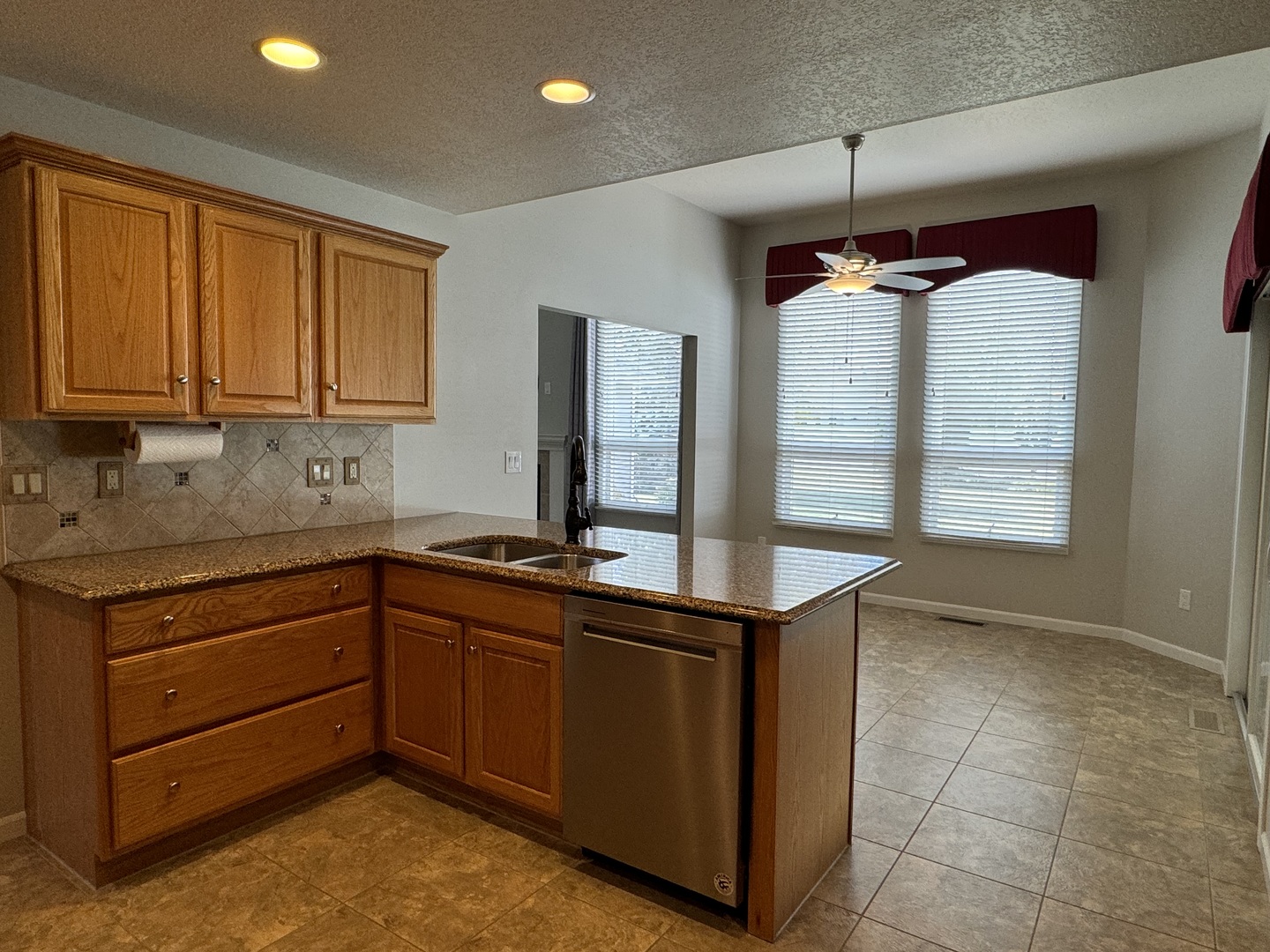 453 East Kay Street Herscher, IL 60941 - Photo 16 of 54 a kitchen with a sink stove and cabinets