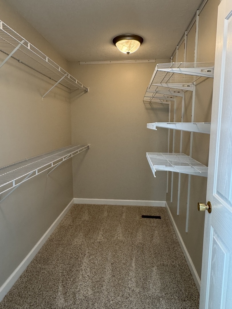 453 East Kay Street Herscher, IL 60941 - Photo 22 of 54 a view of a room with racks on the wall
