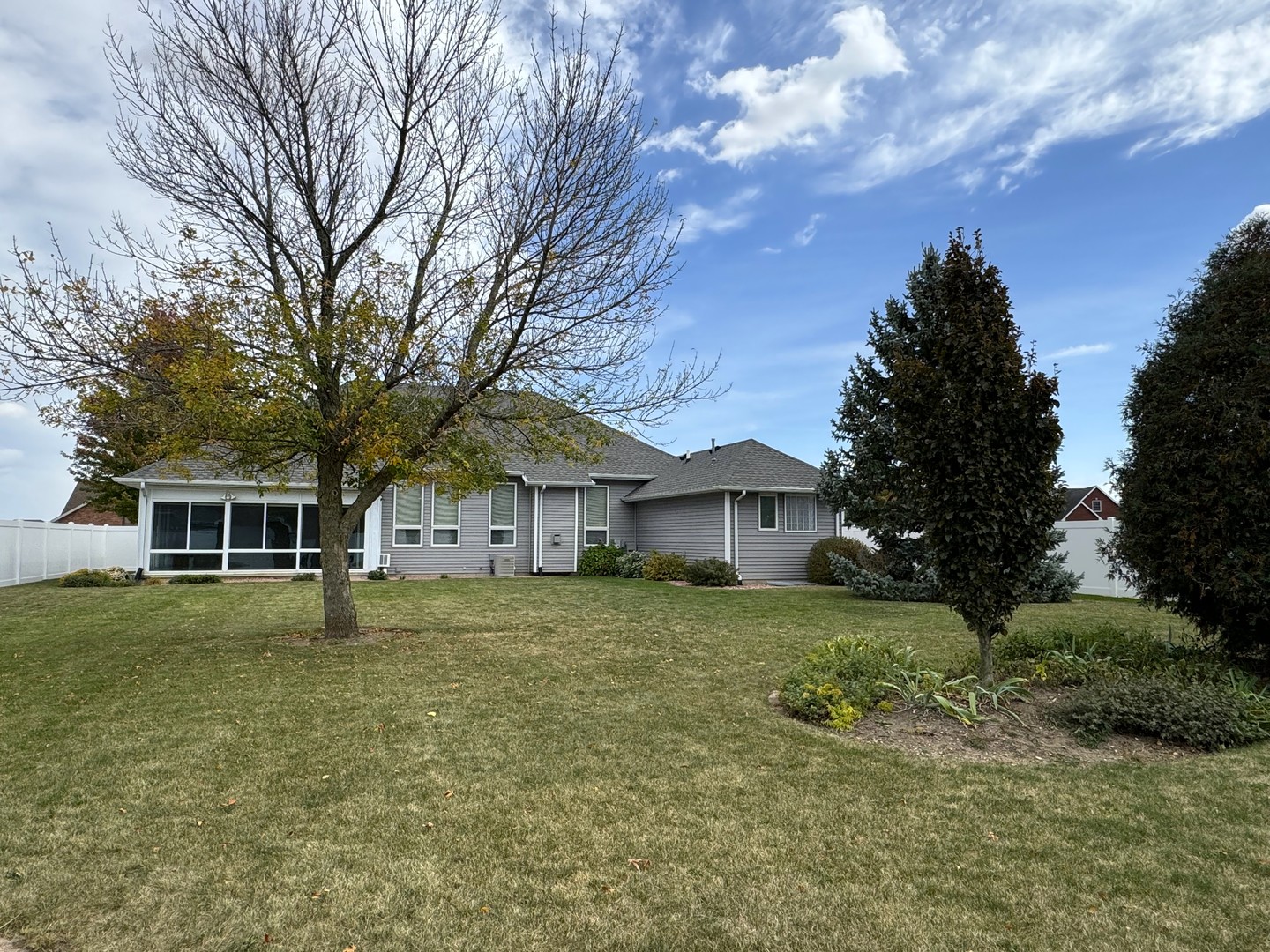 453 East Kay Street Herscher, IL 60941 - Photo 52 of 54 a tree in front of a house with a garden