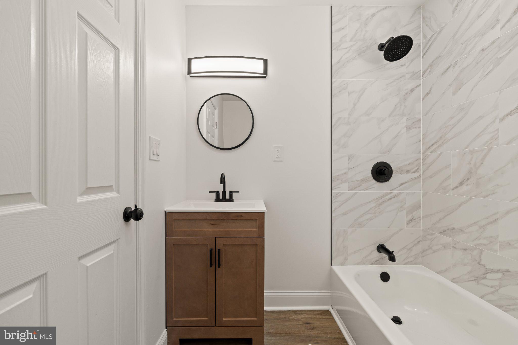 2933 Master Street Philadelphia, PA 19121 - Photo 15 of 20 Modern elegance in a serene bathroom.