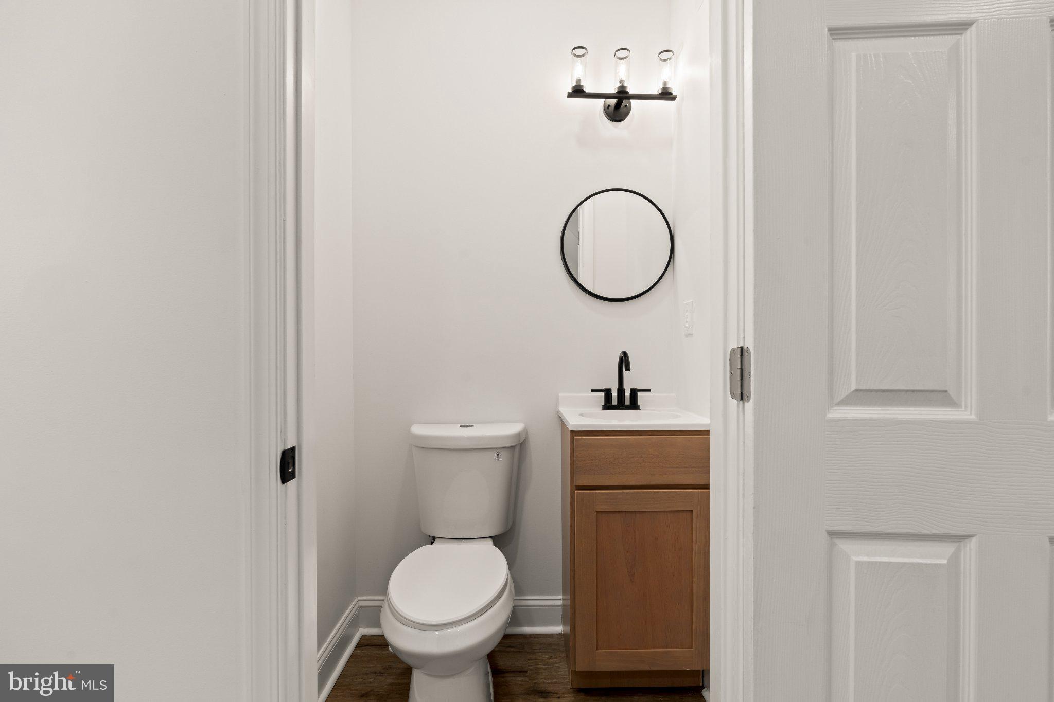 2933 Master Street Philadelphia, PA 19121 - Photo 16 of 20 Sleek and modern half-bath retreat.