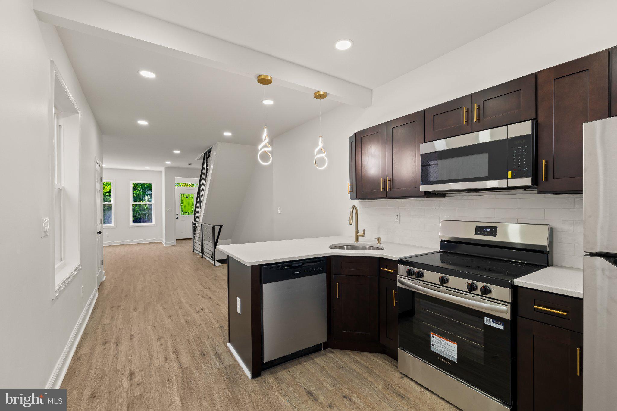 2933 Master Street Philadelphia, PA 19121 - Photo 7 of 20 Modern kitchen with sleek finishes.