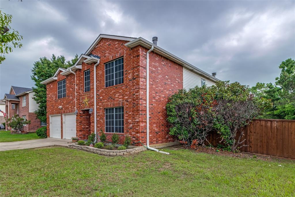 1017 Lake Trail Drive Little Elm, TX 75068 - Photo 2 of 35 front view of a house with a yard