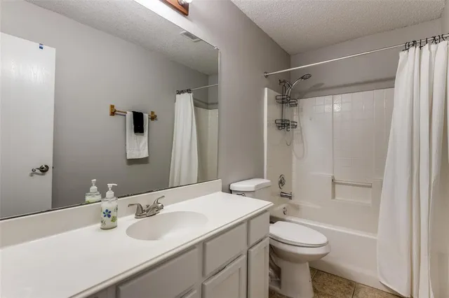 a view of storage and utility room with washer and dryer