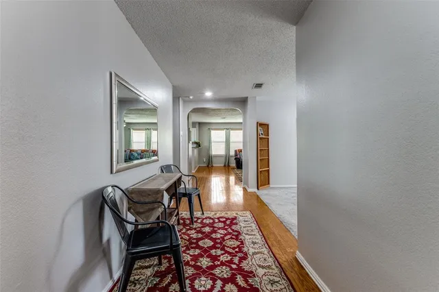 a view of a livingroom with furniture and a rug