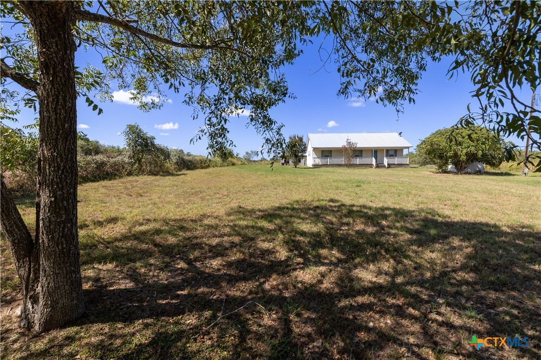 199 Sunset Trail Luling, TX 78648 - Photo 22 of 34 a view of an outdoor space and yard